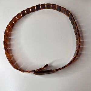 vintage tortoiseshell lucite link belt, likely dating back to the 1960s